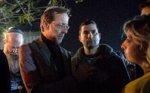 In this Thursday, March 14, 2019 photo, Zehut party leader Moshe Feiglin, second left, attends an election campaign event in Sderot, Israel. The Cinderella story of Israel's current election campaign is a fringe party led by Feiglin, an ultranationalist libertarian with a criminal record, who vows to legalize marijuana in an improbable run to parliament. Feiglin's Zehut party has a real shot of getting elected and could even emerge as a kingmaker in a tightly contested race for prime minister. (AP Photo/Tsafrir Abayov)