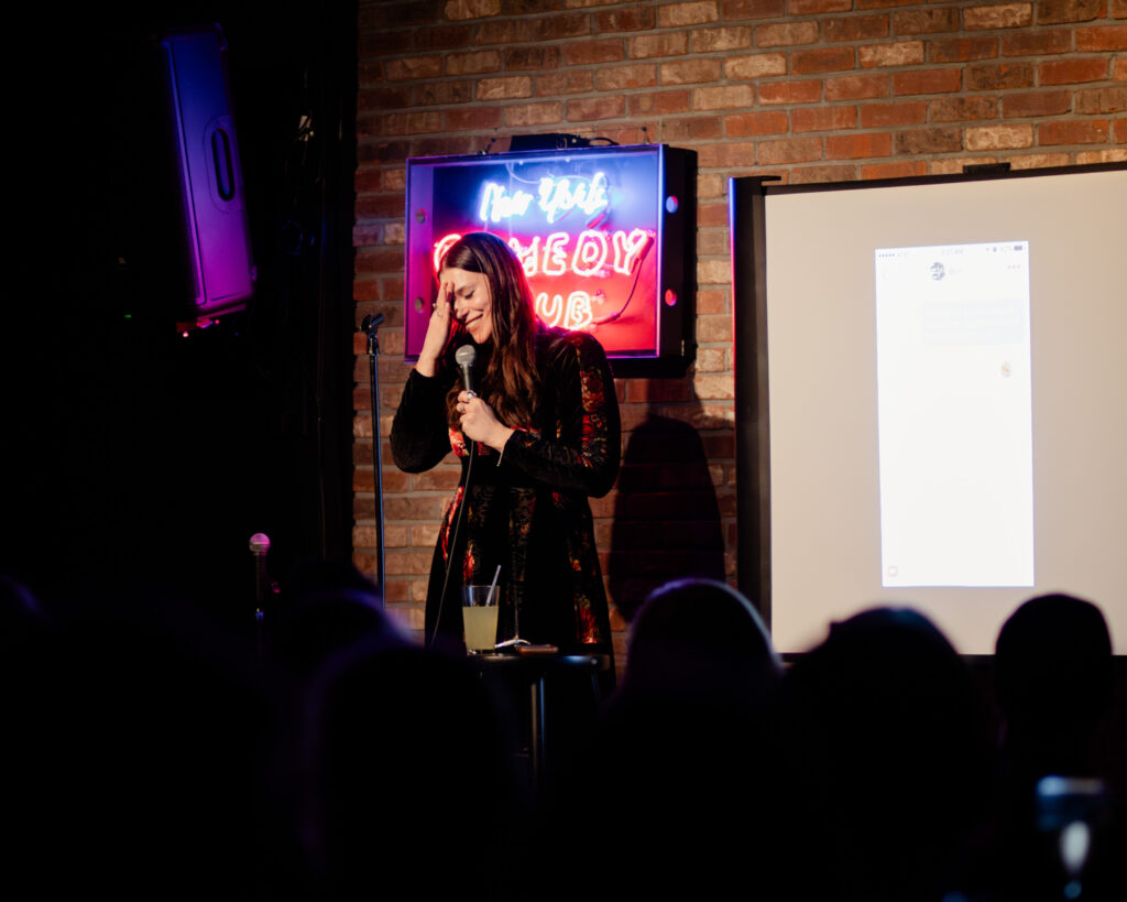 Comedian Lane Moore doing stand up comedy