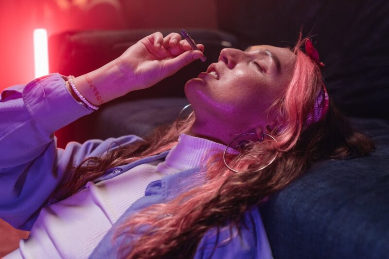 woman smoking cannabis joint